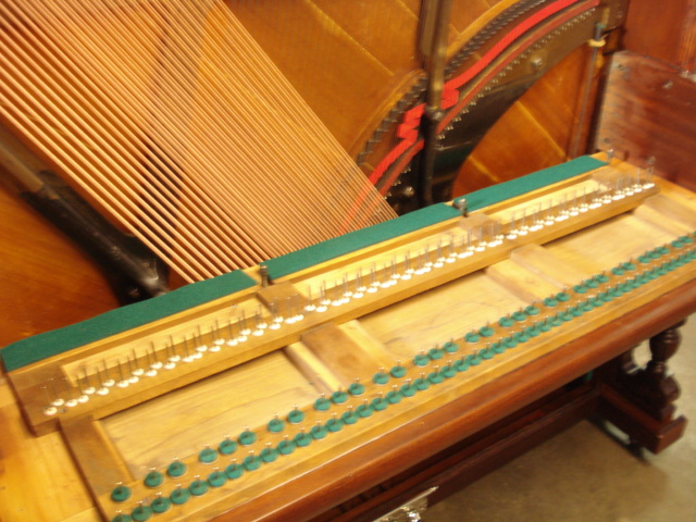 E2 - We installed the keyframe, and glued new key cloth in place on the back rail.